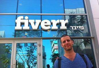me and the Fiverr logo sign