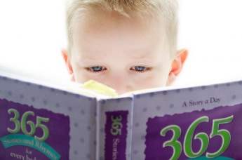 baby reading a book